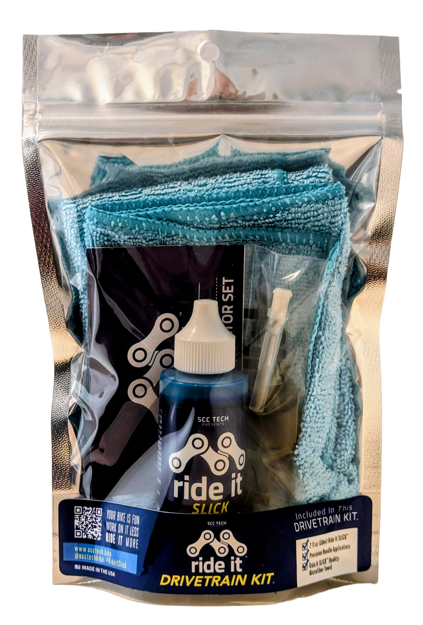 Ride It Drivetrain Kit by SCC Tech, featuring a complete bike maintenance solution. The packaging displays the Ride It brand logo and includes products like Ride It Slick, Ride It Clean, Ride It Smooth, and Ride It Flow. The kit contains 2 fl oz (59 ml) bottle of Ride It Slick drivetrain treatment, precision needle applicators, and a microfiber towel. The label highlights the kit’s focus on enhancing bike performance and protection, with bold text encouraging less time working on it and more time riding it